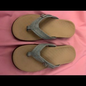 Vionic light blue suede flip-flops.
